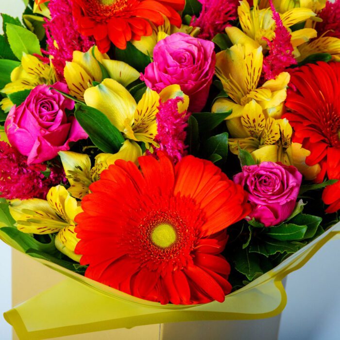 Bouquet with Orange Gerberas and Roses in Coconut wrapping