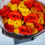 Bouquet of 20 Yellow-Orange Roses in Coconut wrapping