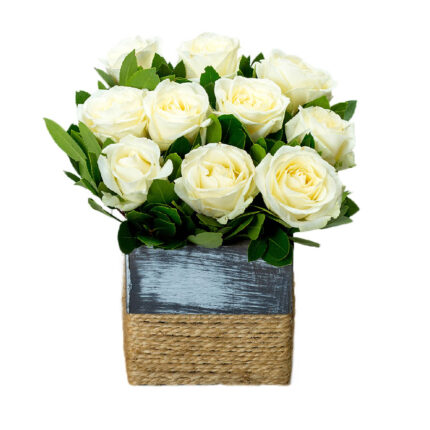 Flower Arrangement with White Roses in Wooden Chapeau