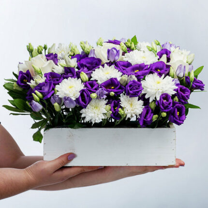 Flower Arrangement with Purple Lysianthus and Rose Blossoms in Wooden Box