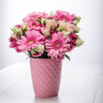 Floral Arrangement with Pink Gerberas and Lysianthus on Pink Ceramic Chapeau