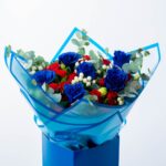 Bouquet with Blue Roses and Eucalyptus in Coconut wrapping