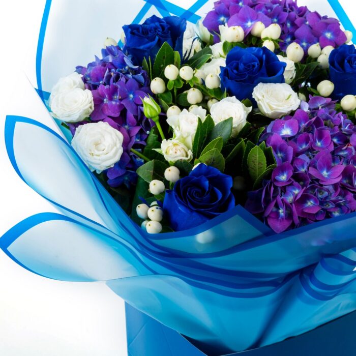 Bouquet with Blue Roses and Hydrangeas in Coconut wrapping