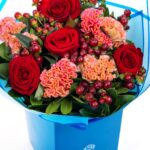 Bouquet with Red Roses and Hypo Flower in Coconut wrapping