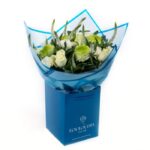 Bouquet with Roses and Chrysanthemums in blue Coconut wrapping